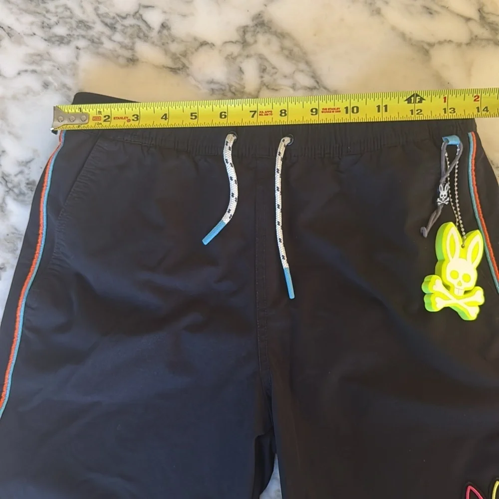 NWOT Psycho Bunny Leo Hydrochromic Swim Trunks Boys 14/16 - Black Neon Logo